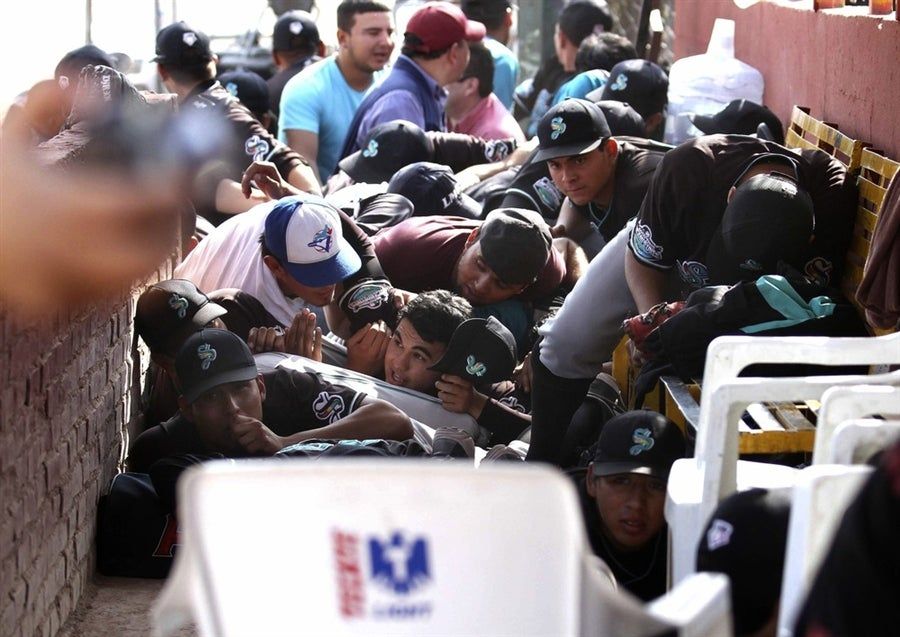 This Is What It Looks Like When A Baseball Team Takes Cover During A Gunfight