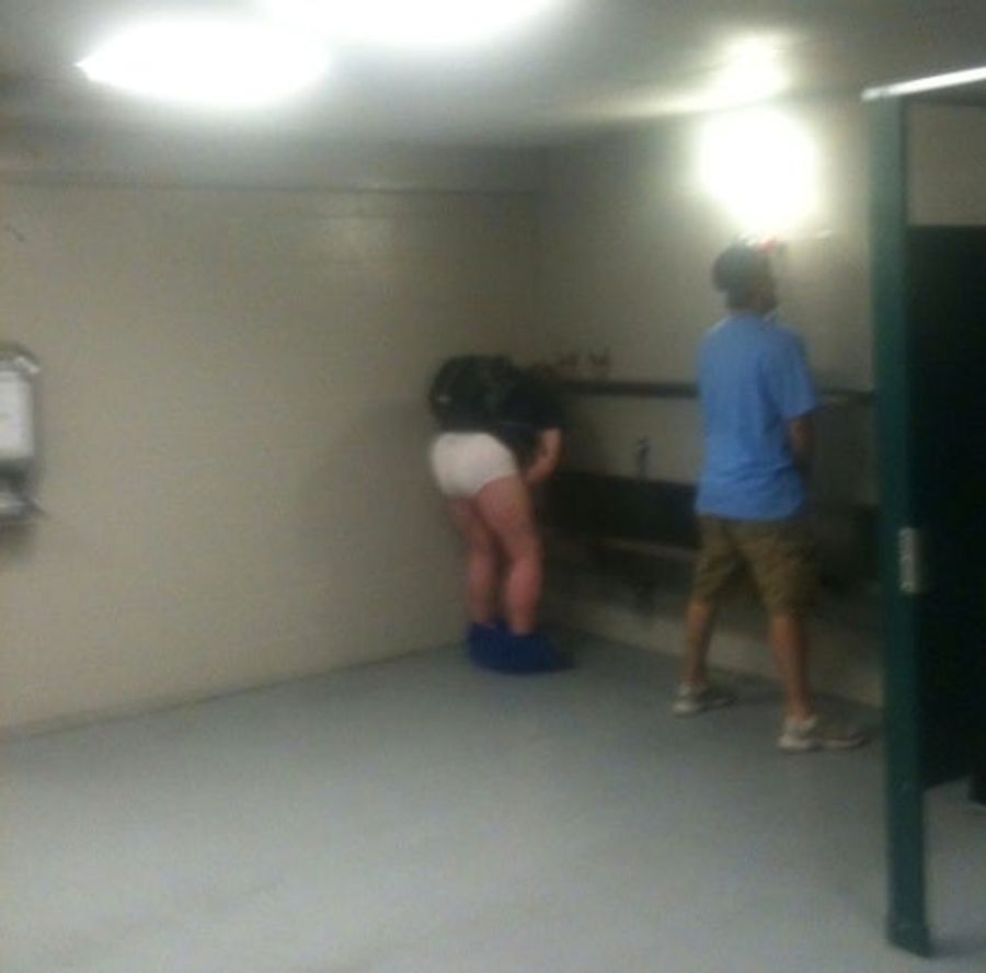 Cubs Fan Struggles With Urinal, Fashion
