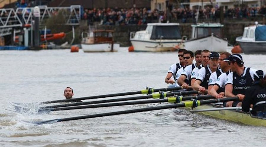 A Boat Race Between Oxford And Cambridge Was Interrupted By A Swimmer