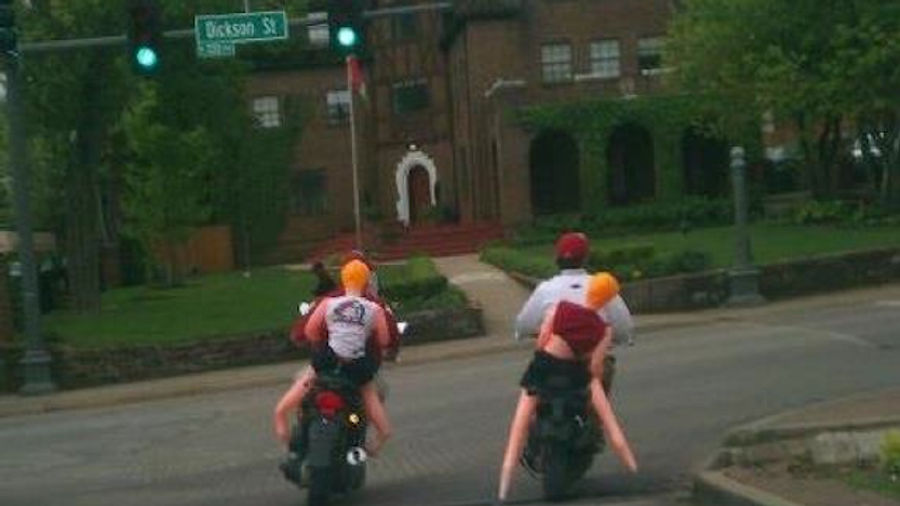 Two Blonde Blow-Up Dolls Got Motorcycle Rides On The Arkansas Campus Today