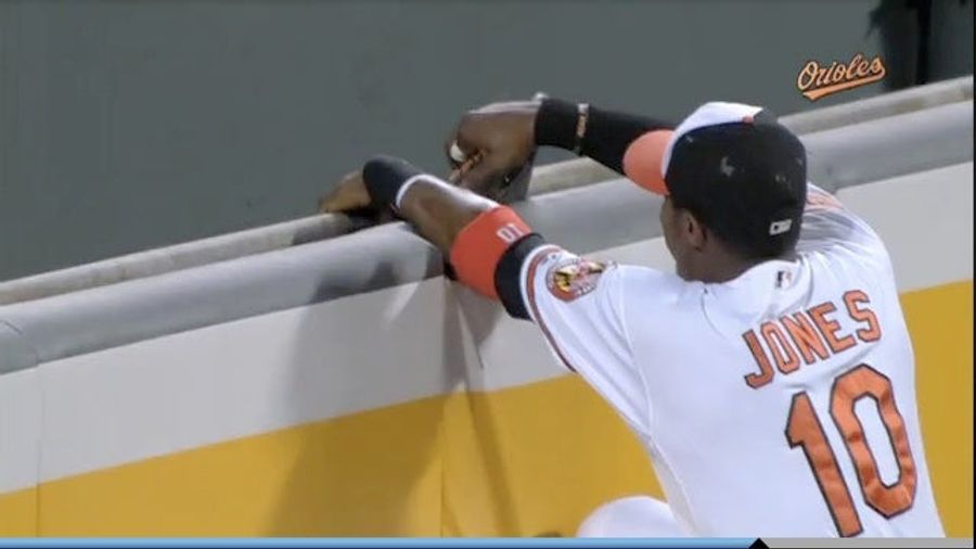Adam Jones Reaches For Home Run, Gets Glove Stuck In Wall