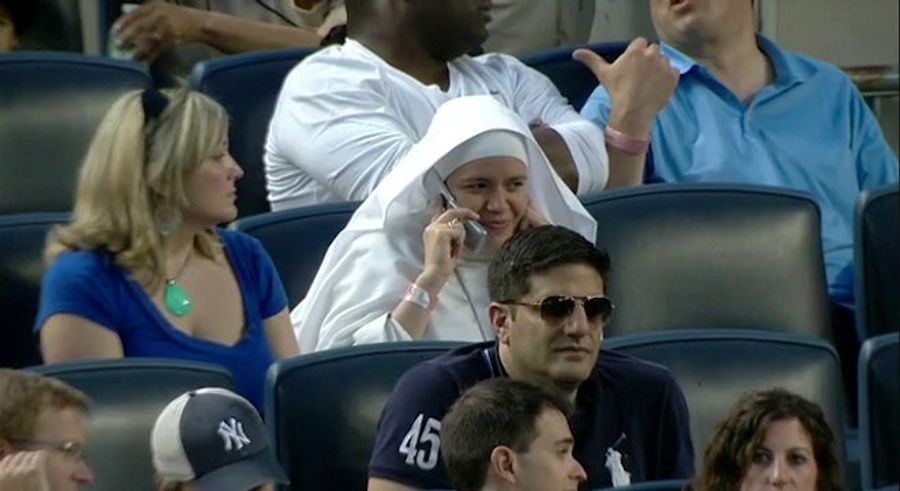 This Nun In Field-Level Seats At Yankee Stadium Just Had To Take That Call On Her Flip Phone