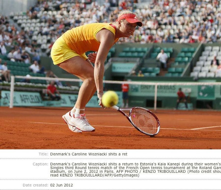 Today In Photograph And Caption Synergy: Caroline Wozniacki Shits A Return