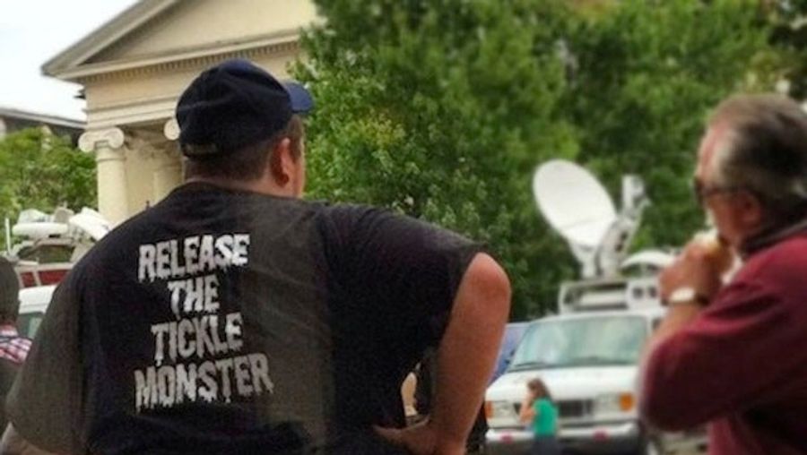 Someone Is Wearing A &quot;Release The Tickle Monster&quot; T-Shirt Outside The Jerry Sandusky Trial