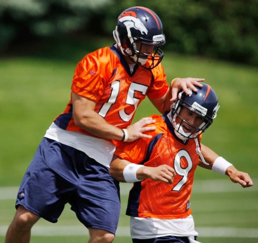 Someone's Trying To Stop The Tim Tebow-Brady Quinn Catfight