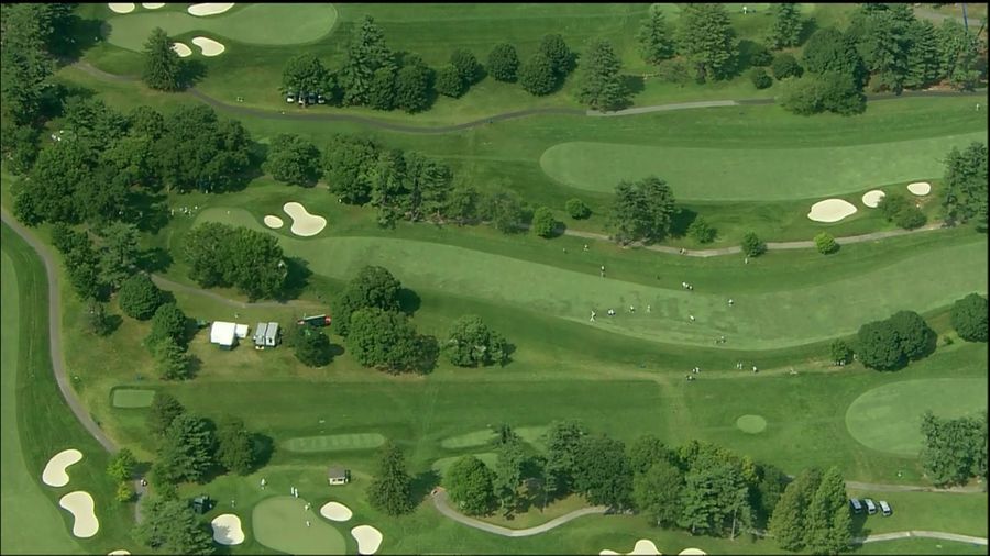 Who Are Golf's "Invisible Man" Guys?