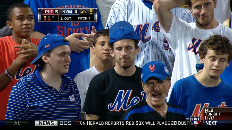 Caption Contest: What Are These Mets Fans Up To?