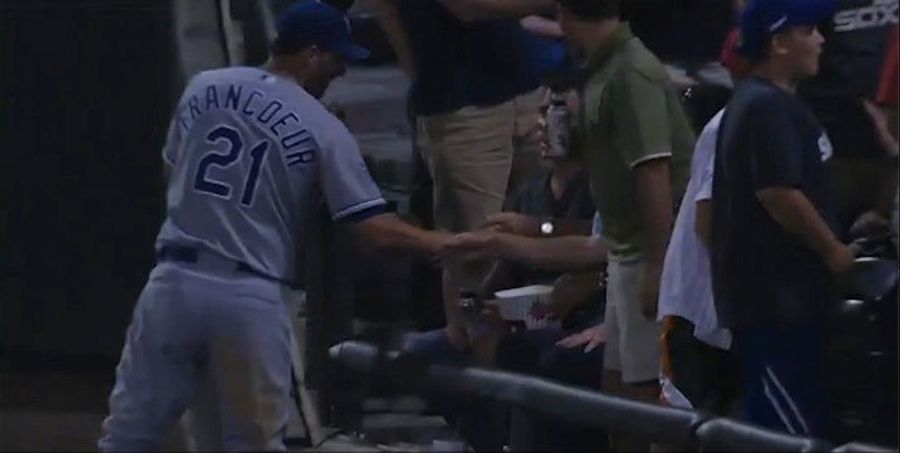 Jeff Francoeur Helps Himself To A Fan's Popcorn