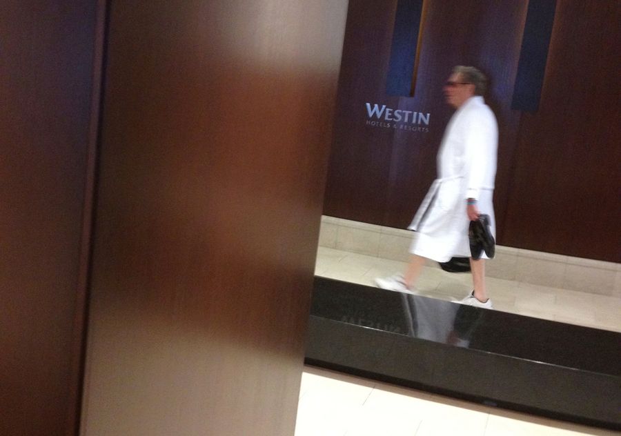 John Sterling Can&#39;t Stop Walking Around The Hotel Lobby In His Bathrobe