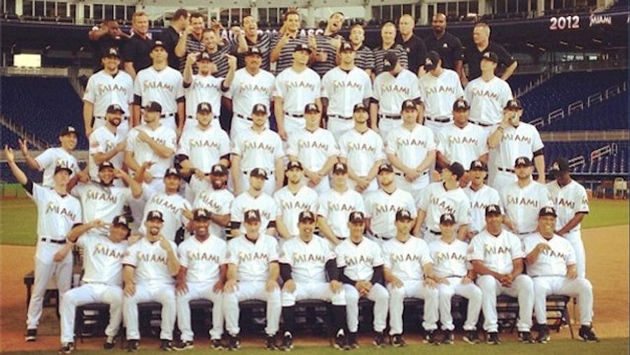 Your Marlins Team Photo, Complete With Both Of John Buck&#39;s Middle Fingers