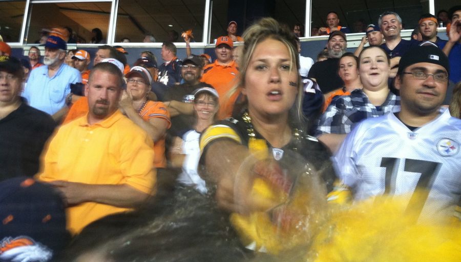 This Photo Captures The Moment A Pissed-Off Steelers Fan Threw Her Beer On The Photographer After Tracy Porter's Game-Ending INT