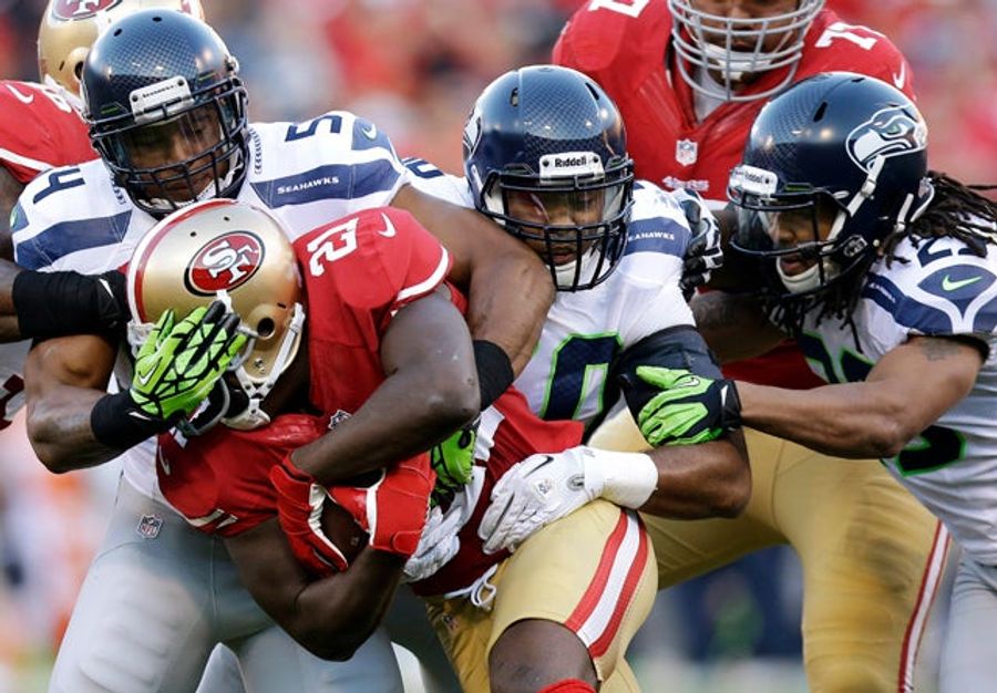 Russell Wilson Getting The Football Snapped Into His Ass Summed Up The Seahawks' Offense