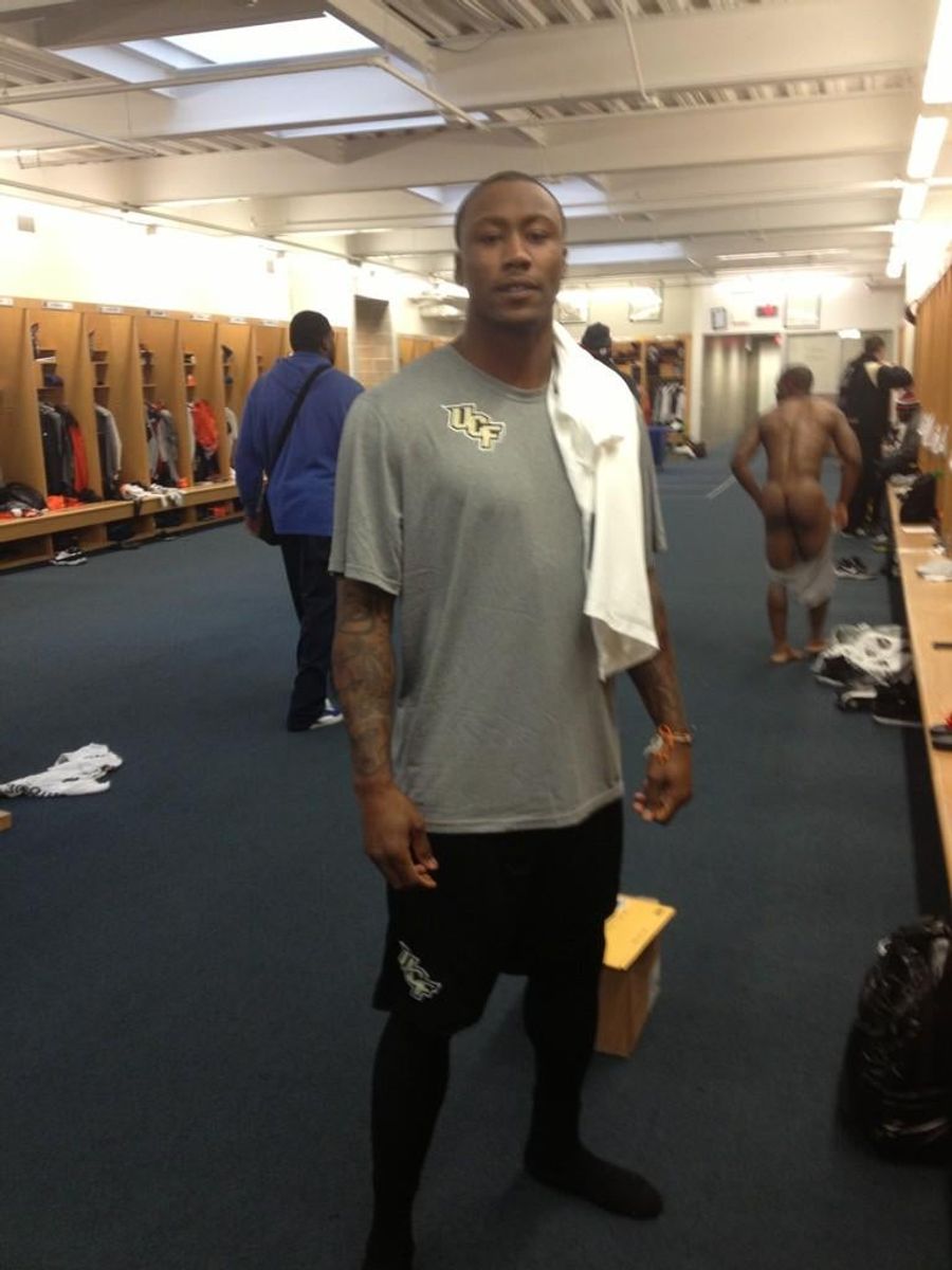 Brandon Marshall Took A Picture In Front Of A Big Naked Bear Ass