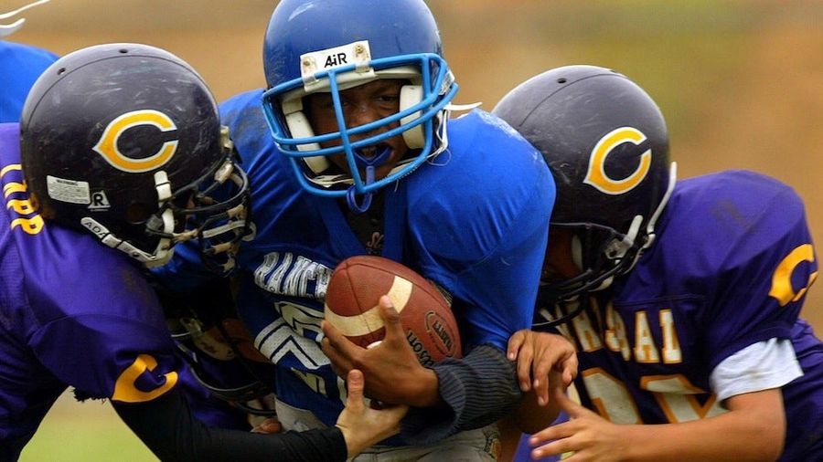 Why Do We Let Kids Play Tackle Football?