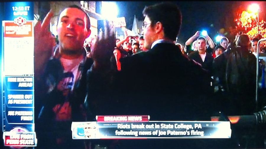 This Penn State Student Is The Face And Two Fingers Of The State College Sweatpants Riots