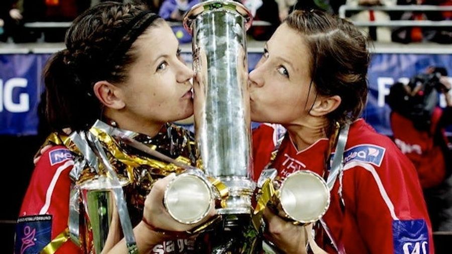 This Evening: Two Women Kiss A Trophy That Looks Like Something Other Than A Trophy