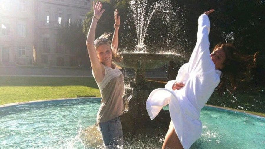 This Evening: Hope Solo, In A Bathrobe, In A Water Fountain