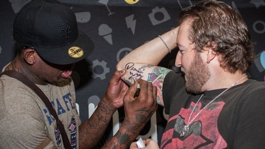 A Fan At The Dennis Rodman Viewing Party Experience Got Rodman's Autograph Tattooed On His Arm