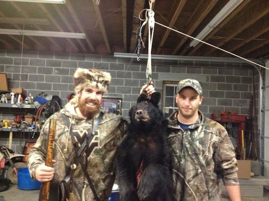West Virginia Student Mascot Shoots A Bear; Bear Falls Out Of A Tree; Everyone Hollers