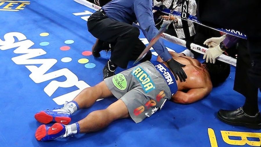 Manny Pacquiao's Entourage Allegedly Attacked A Photographer For Taking Pictures Of Knocked-Out Pacquiao