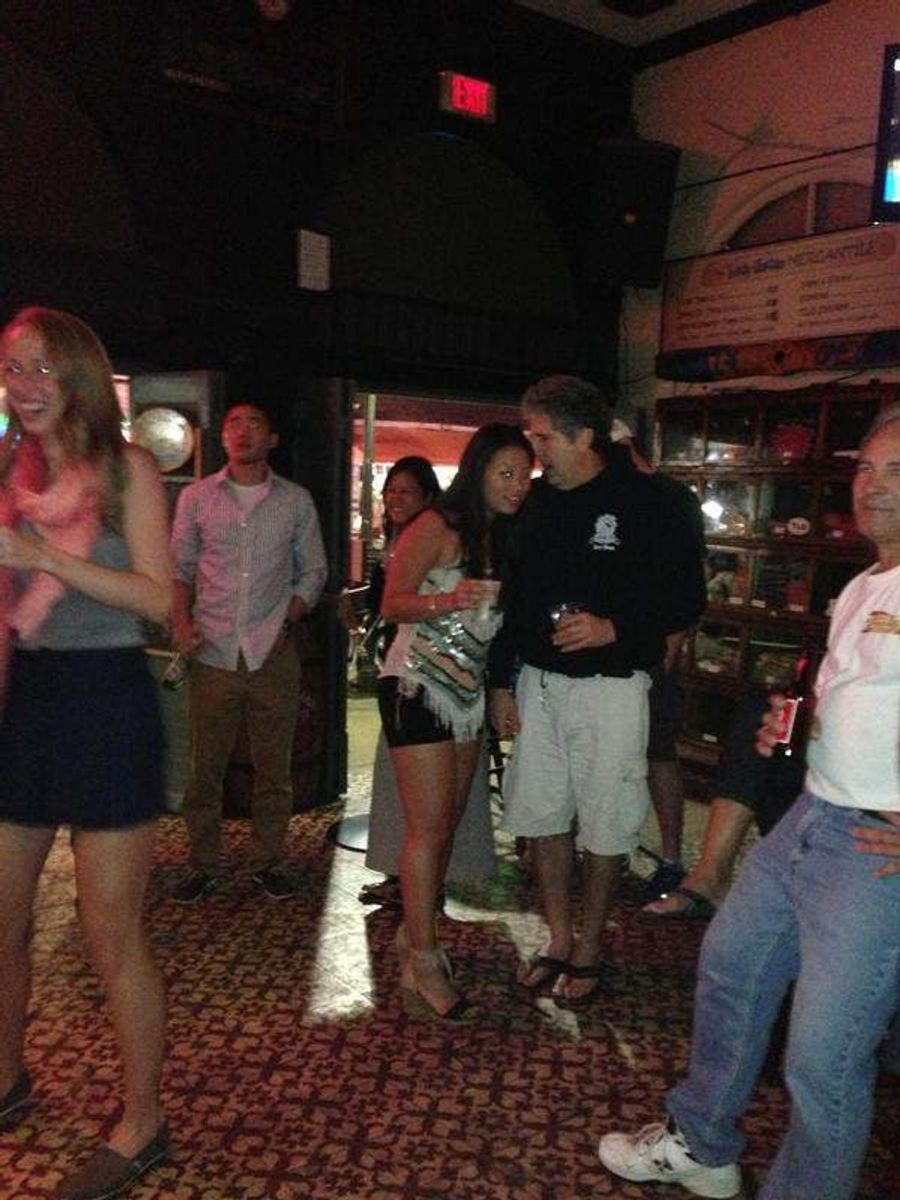 Here&#39;s A Picture Of Mike Leach Possibly Macking On A Young Lady In A Key West Bar [UPDATE]