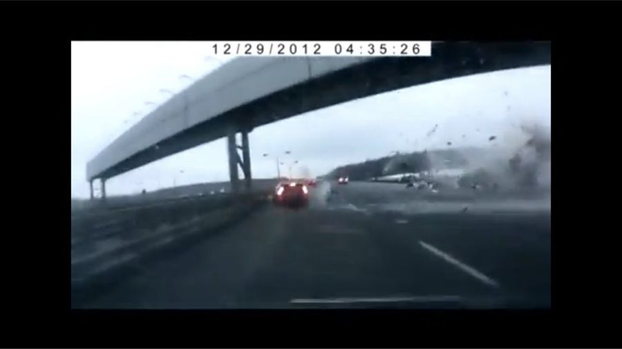 Russian Dash Cam Captures Moscow Plane Crashing Into Highway
