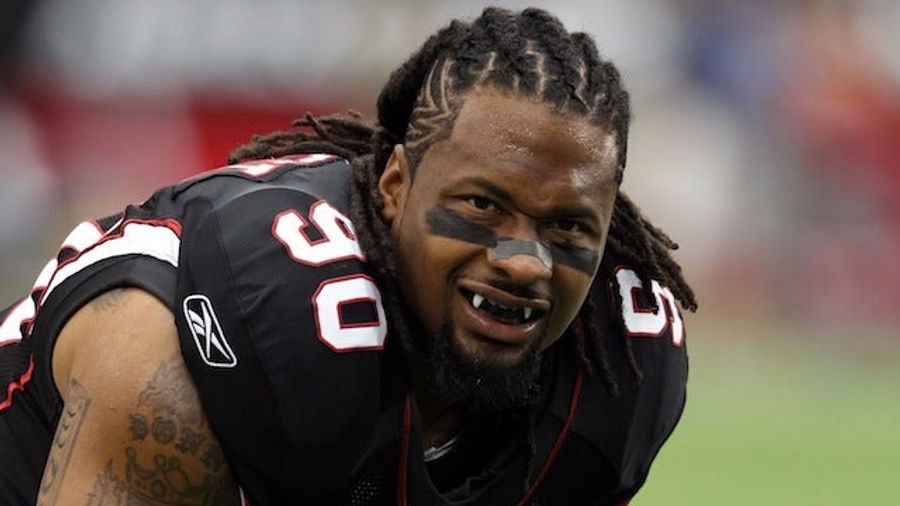 Darnell Dockett Wants To Cheer Up Manti Te'o By Taking Him To The Strip Club