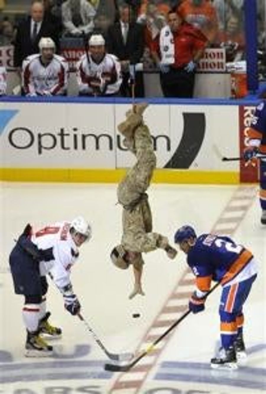 Air National Guardsman Rappels From Rafters, Drops Ceremonial First Puck At Islanders Capitals Game