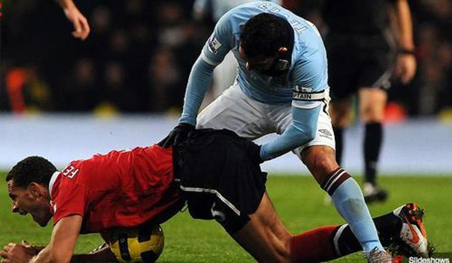 It Looks Like Soccer Player Rio Ferdinand Got Stone-Cold Fisted The Other Day