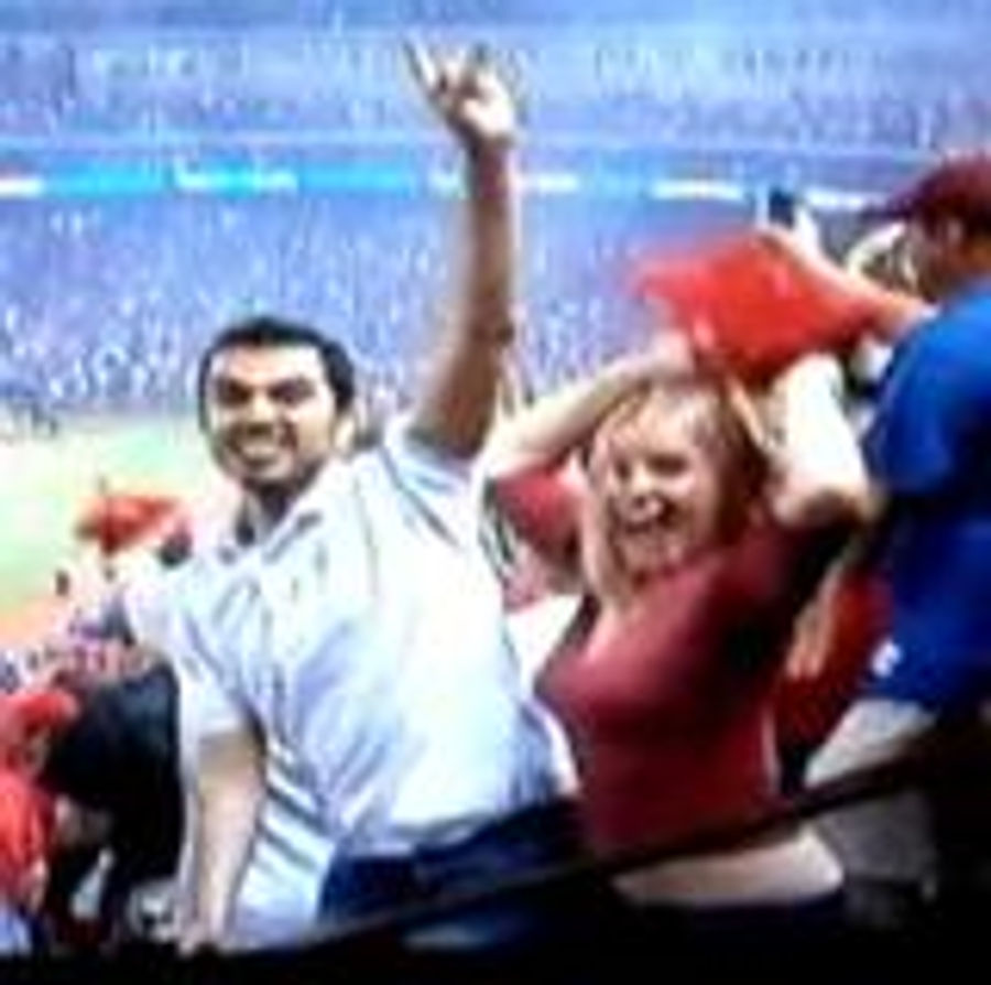 Rangers Fan Bounces In Victory Celebration