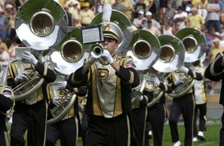 Bowl-Bound Schools Save Money By Spending Less Money