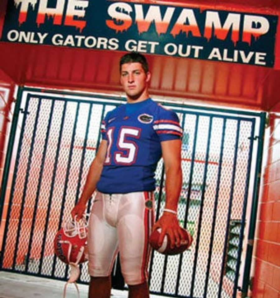 What Mysterious (And Heroic) Injury Is Tim Tebow Hiding?