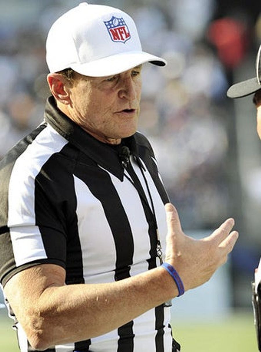 Ed Hochuli Curls The Pain Away