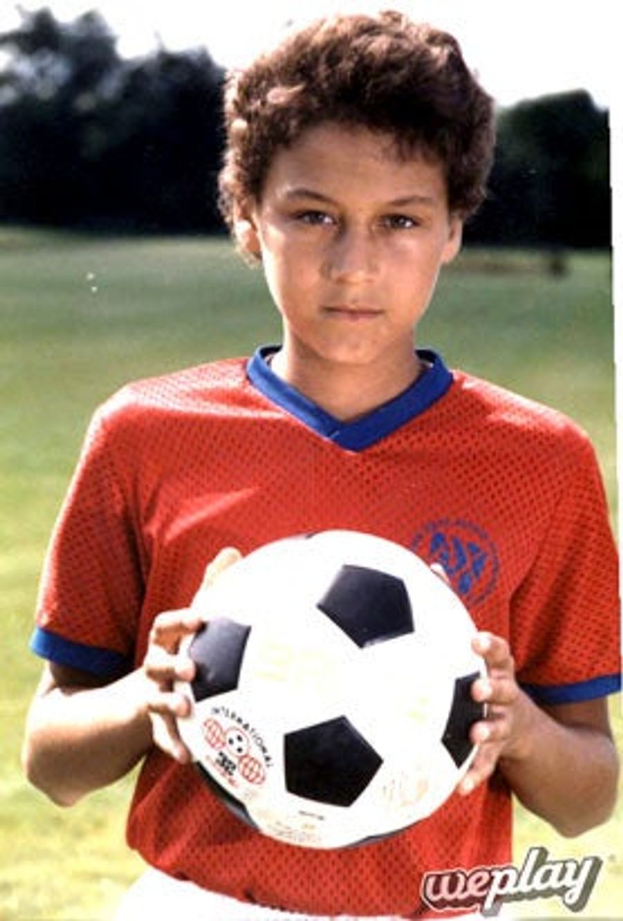 Who Is This Dashing Soccer Player, And Why Is He Using His Hands?