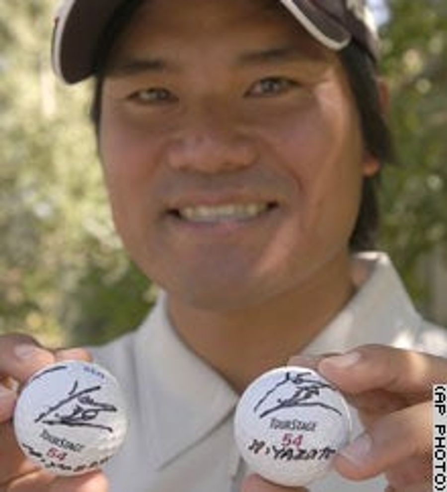 Japanese Golfer Proudly Displays His Balls