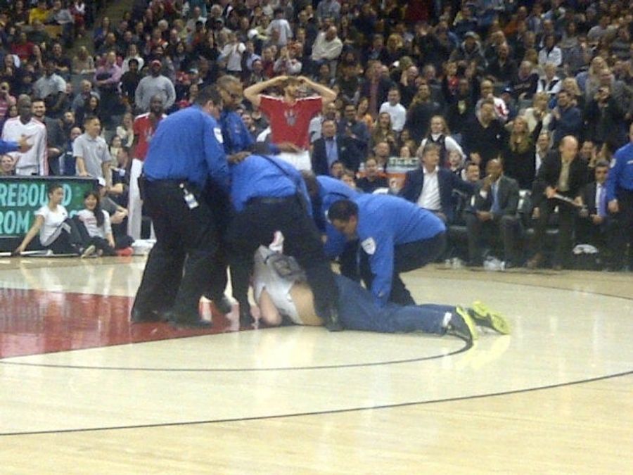Guy Who Ran Onto The Court During A Toronto Raptors Game Wearing &quot;Bucket List&quot; Shirt Has Super-Lame Bucket List