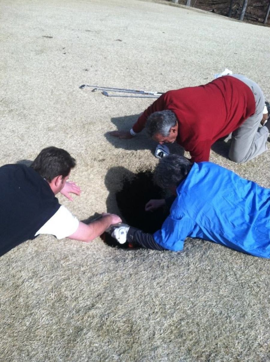 Golfer Falls Down 18-Foot Sinkhole On Fairway