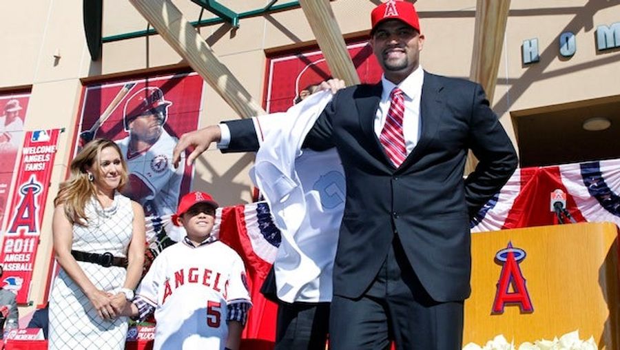 Albert Pujols's Wife Is "Mad At God," The Cubs Are Looking For A First Baseman, And More From The Hot Fucking Stove