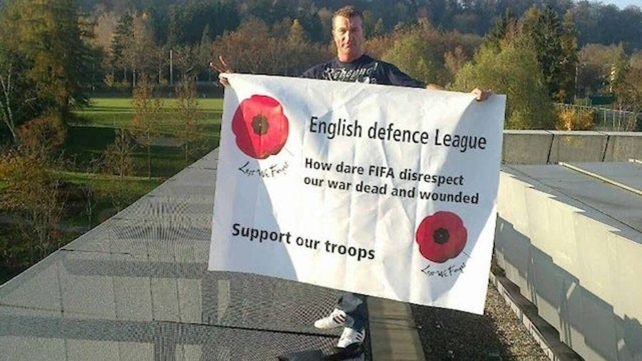 Two Members Of An Extremist Right-Wing English Group Occupied The Roof Of FIFA Headquarters Today