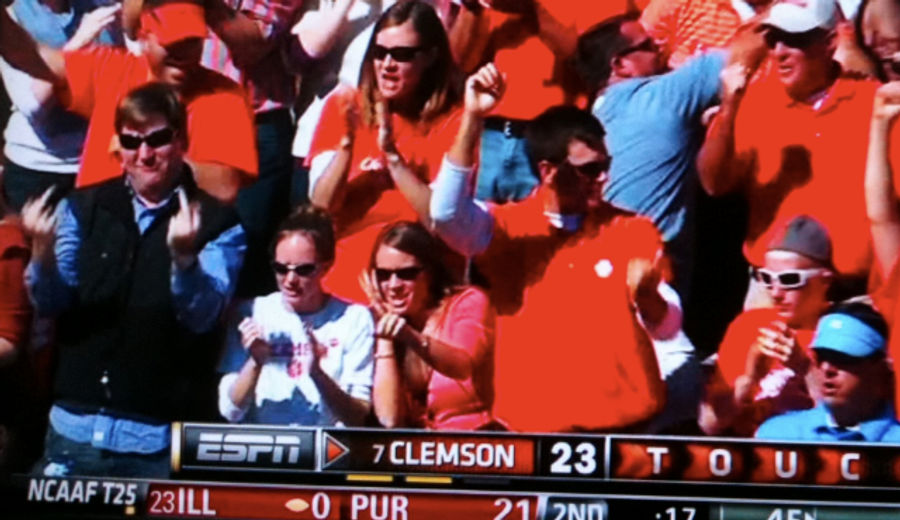 The Guy Wearing Blue In A Sea Of Clemson Orange Gives A Two-Finger Salute