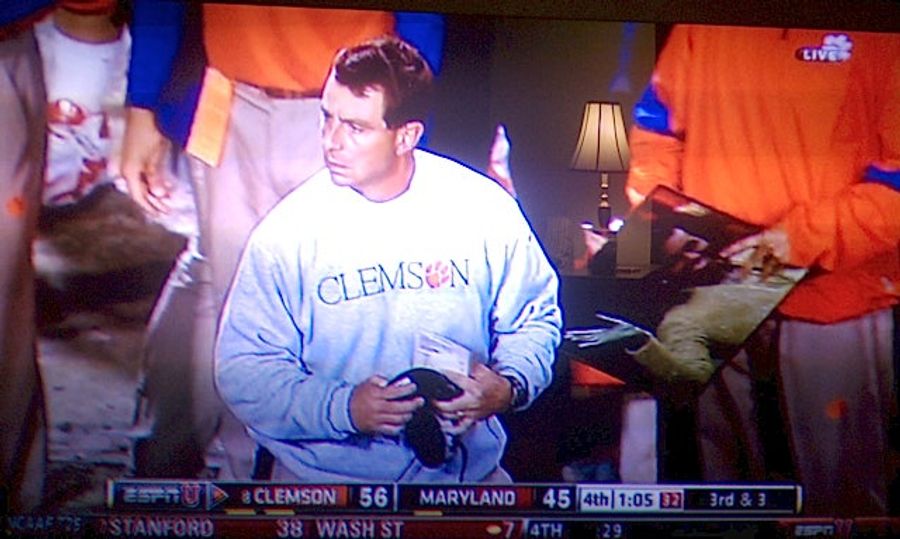 Why Yes, It Does Look Like A Clemson Coach Had A Michelle Obama Trapper Keeper On The Sidelines