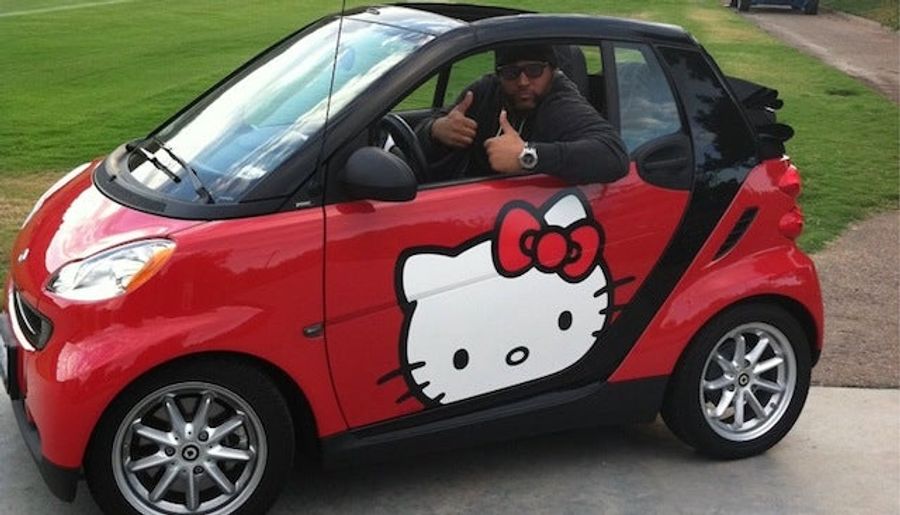 This 6-Foot-4, 320-Pound NFL Player Drives A Hello Kitty Convertible Smart Car