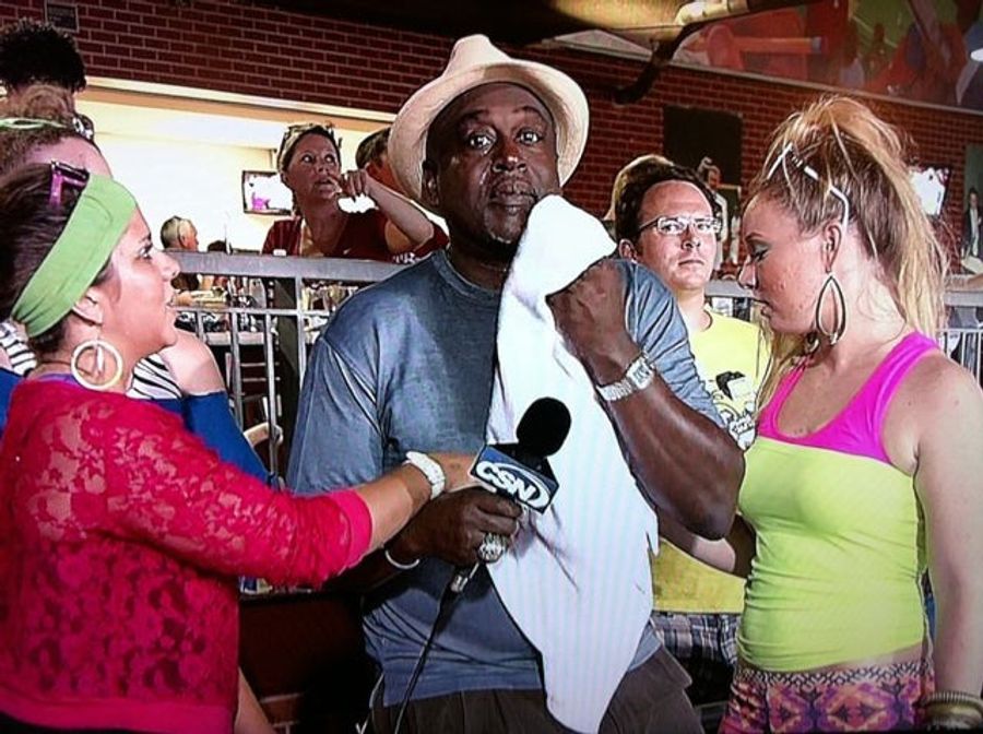 Here&#39;s A Picture Of A Baseball Commentator Sweating Profusely While Flanked By Ladies In Eighties Gear