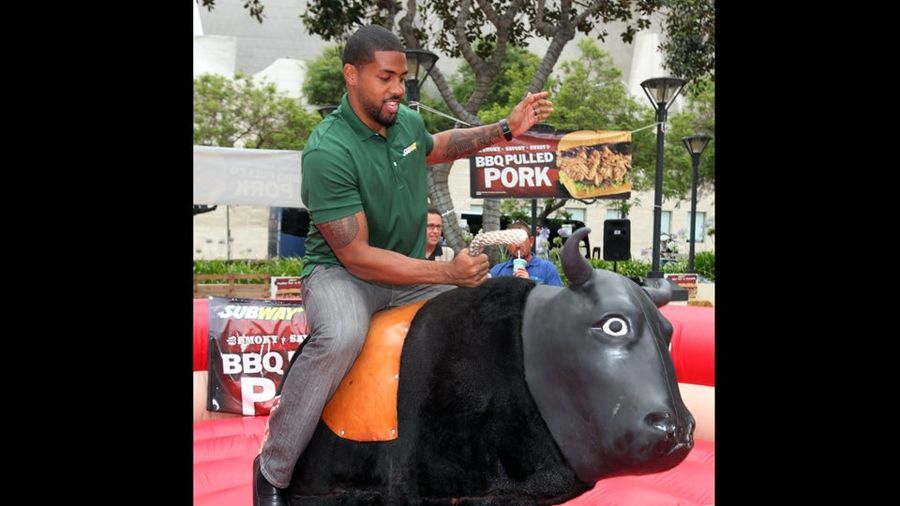 Arian Foster Stays In Shape By Riding A Mechanical Bull While Jared From Subway Looks On