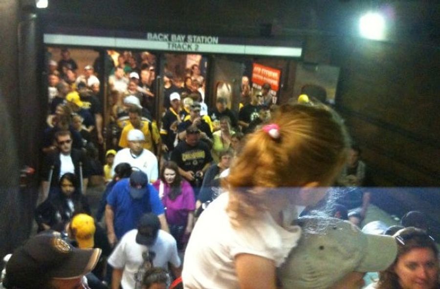 Mother, Escalator, Crowd Team Up To Ensure Boy's Sock Looks Like Schilling's Before Bruins Parade