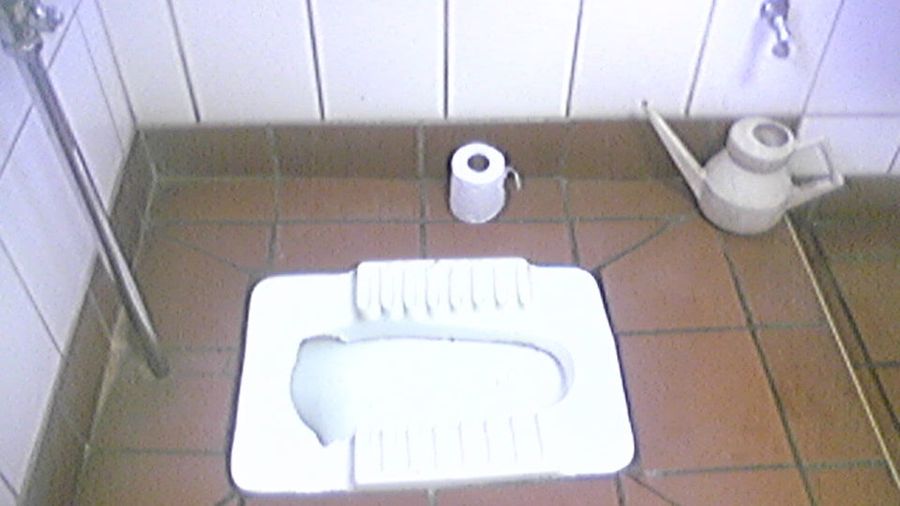 Azerbaijani Reporters Throw Toilet Paper, Antiquated Bathroom Device At Soccer Coach After Loss