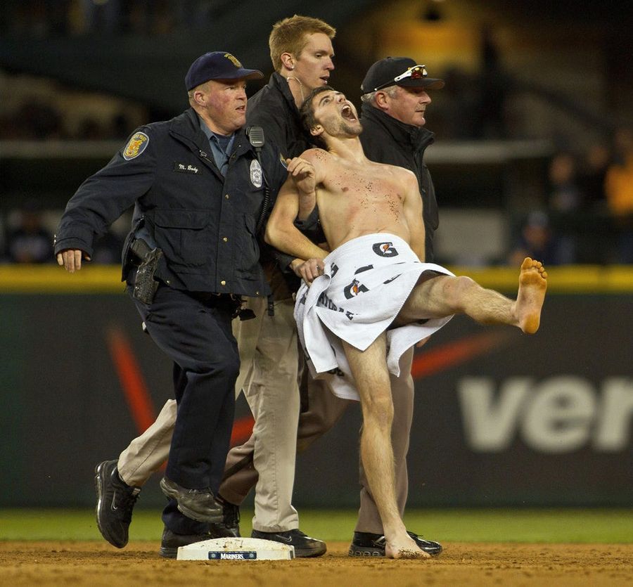 Here&#39;s A Photo Of The Seattle Mariners Streaker In The Loving Grasp Of Three Committed Security Guards