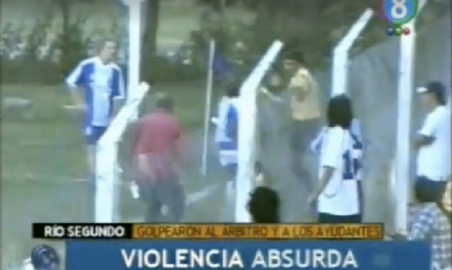 Soccer Match On Field Surrounded By Barbed Wire Unpredictably Marred By "Absurd Violence"