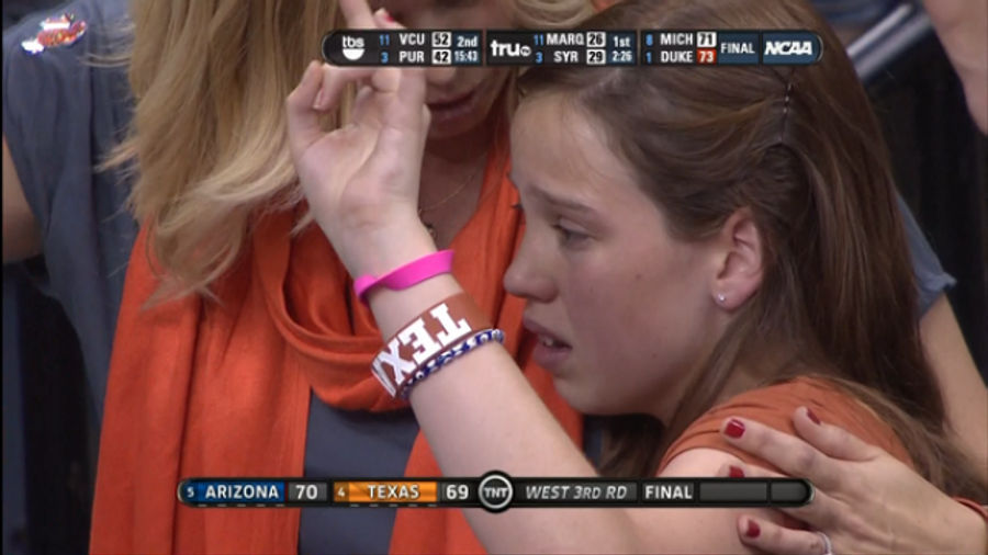 Even Through The Tears, Young Texas Fan Manages A Brave Hook 'Em Horns