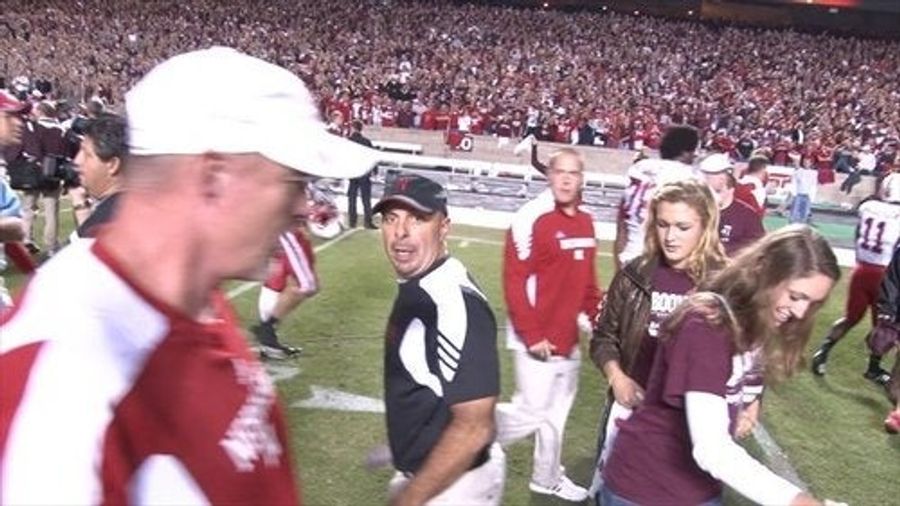 Did Nebraska Defensive Coordinator Carl Pelini Rough Up A Texas A&M Photographer? (Updated With Video)